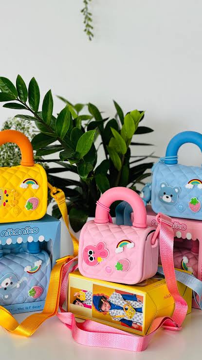 Silicon sling bag ( free key chain)