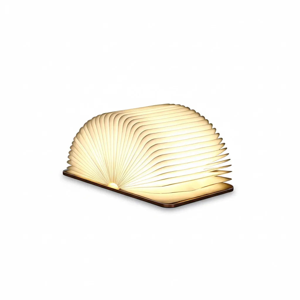 Book-shaped lamp with a warm glow on a white background